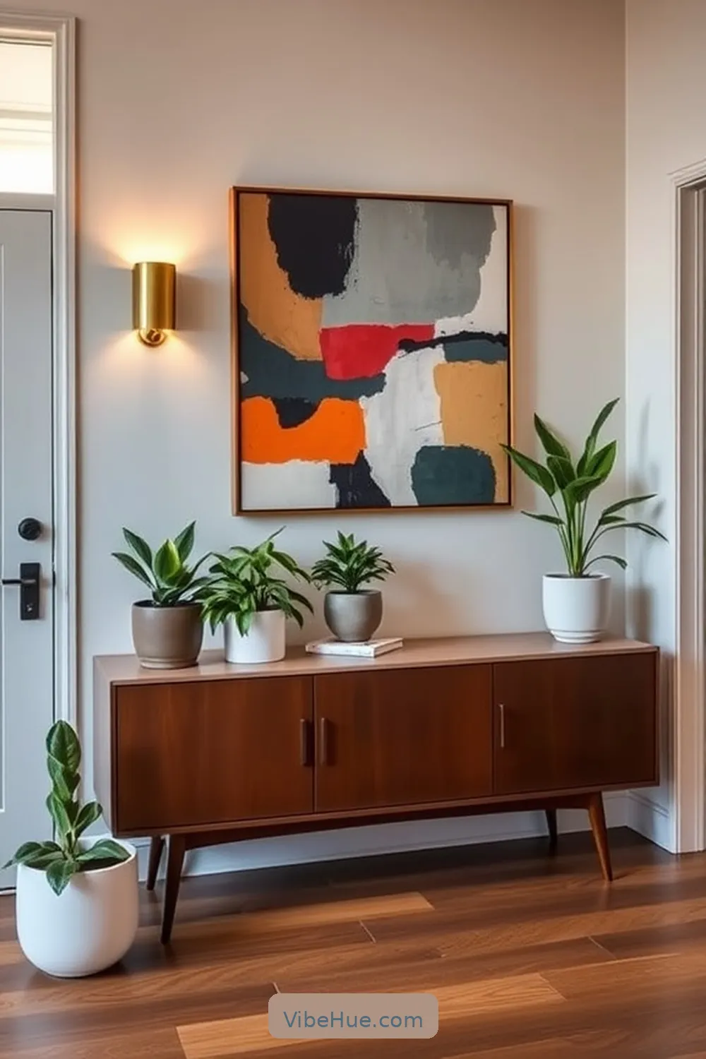 Include a Welcoming Console Table for 15 Essential Elements for Year-Round Mid-Century Modern Style Entryway