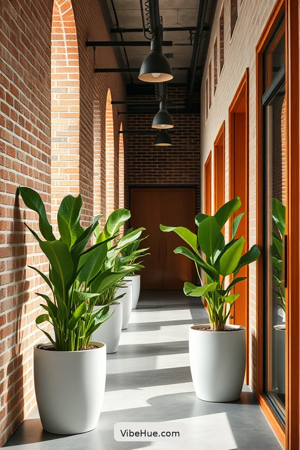Add Greenery With Minimal Planters for 18 Tips for Year-Round Industrial Style in Your Hallway