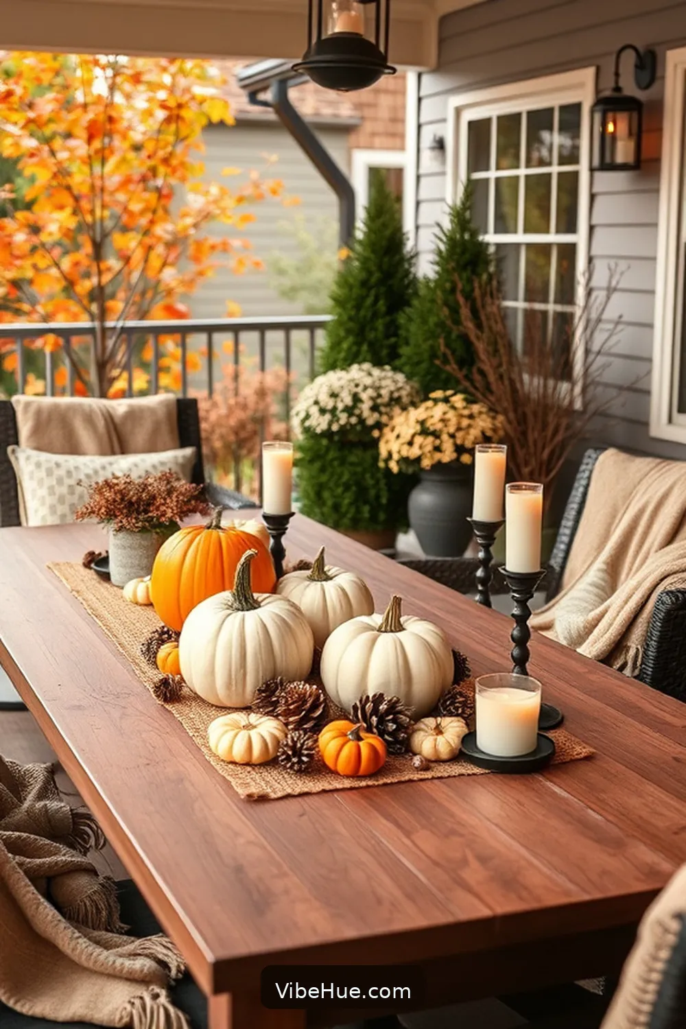 Include Simple, Seasonal Centerpieces for 24 Minimalist Ideas for Fall Outdoor Patio Style